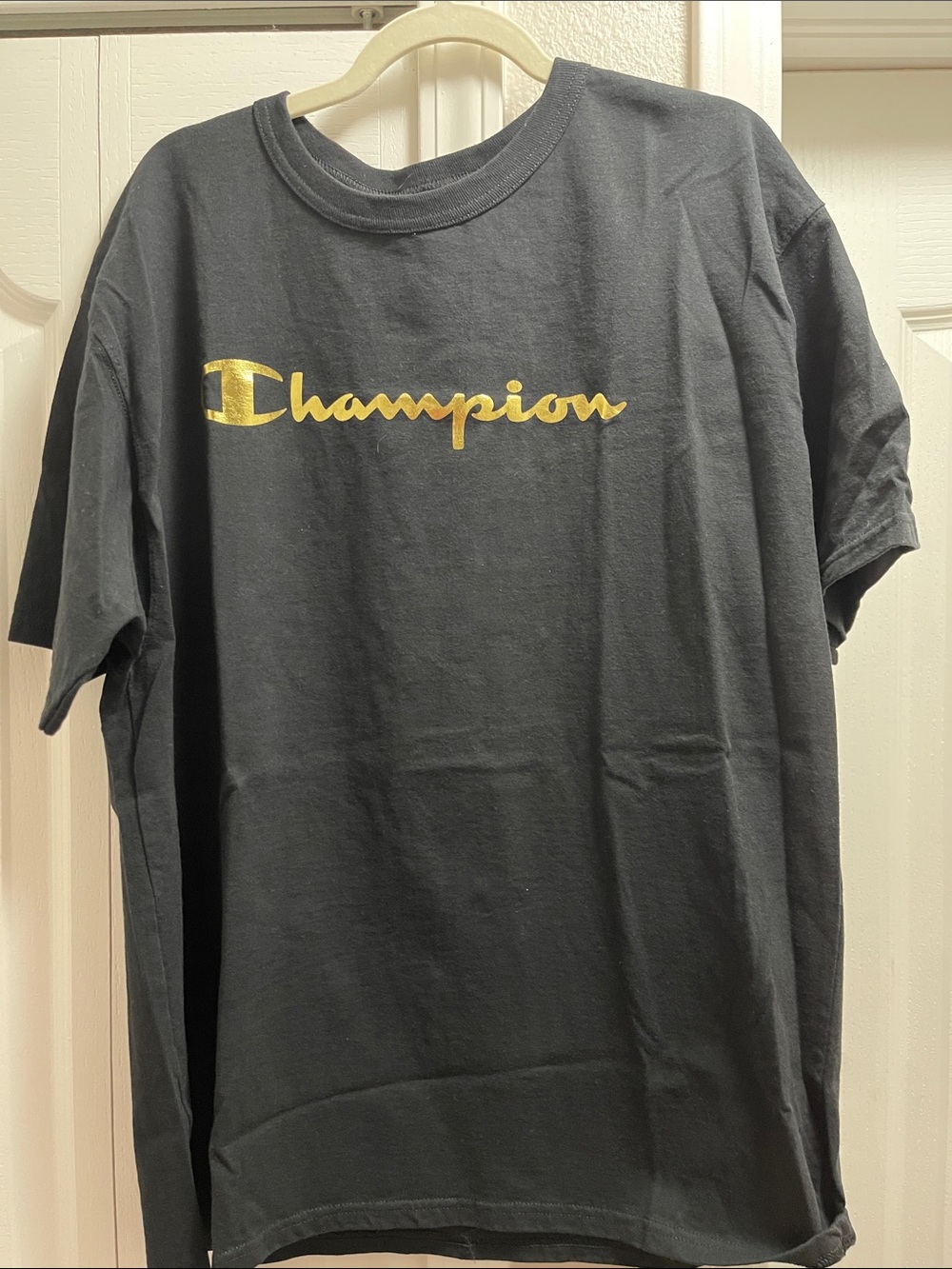 Champion Black Short Sleeve Tee with Gold Script Logo